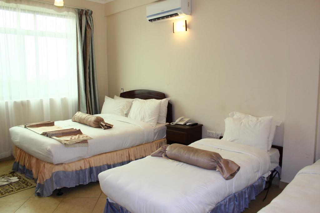 Grace Land Hotel Аруша Экстерьер фото